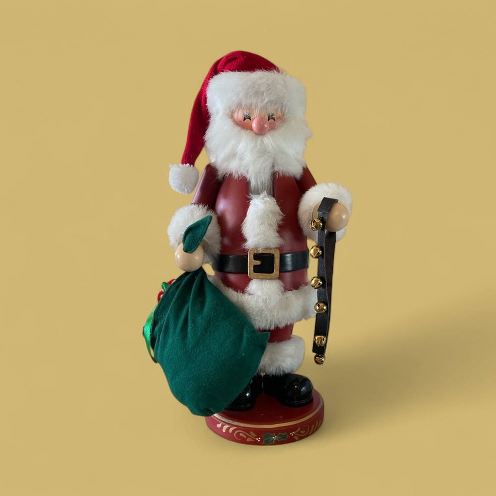 Jolly Santa Claus Nut Cracker
with Green Bag and Bells